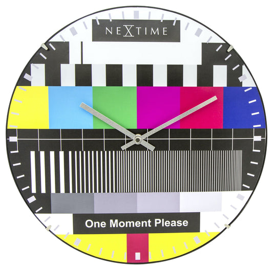 NeXtime Clocks wall clock with 35 cm diameter dome glass design, featuring a modern, minimalist look.