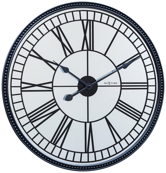 NeXtime Clocks Cleopatra mirror wall clock, 56 cm with a sleek mirror finish and elegant design.