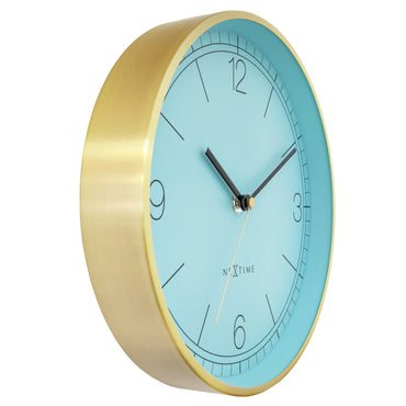 NeXtime Bolero wandklok van 25cm met turquoise, wit en zwart, metalen ontwerp, stille werking, zijaanzicht.