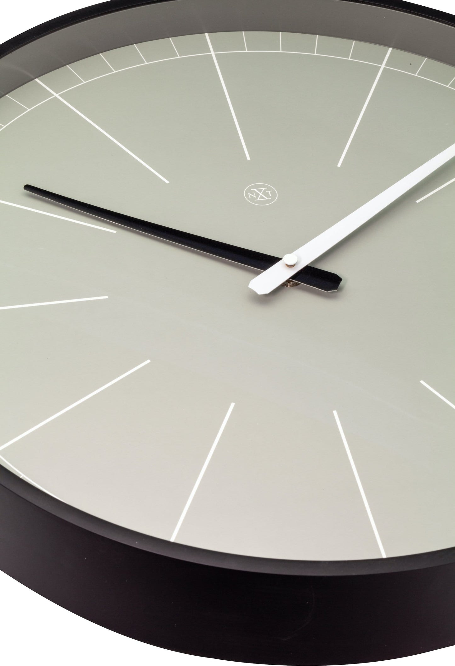 Gray 40 cm plastic wall clock by NeXtime Clocks showing a sleek, modern design with clear clock hands and minimalistic style.