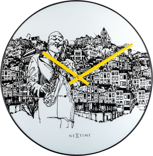 NeXtime Clocks Sax City wall clock with 40 cm glass and metal design, featuring modern style and bold black hands.