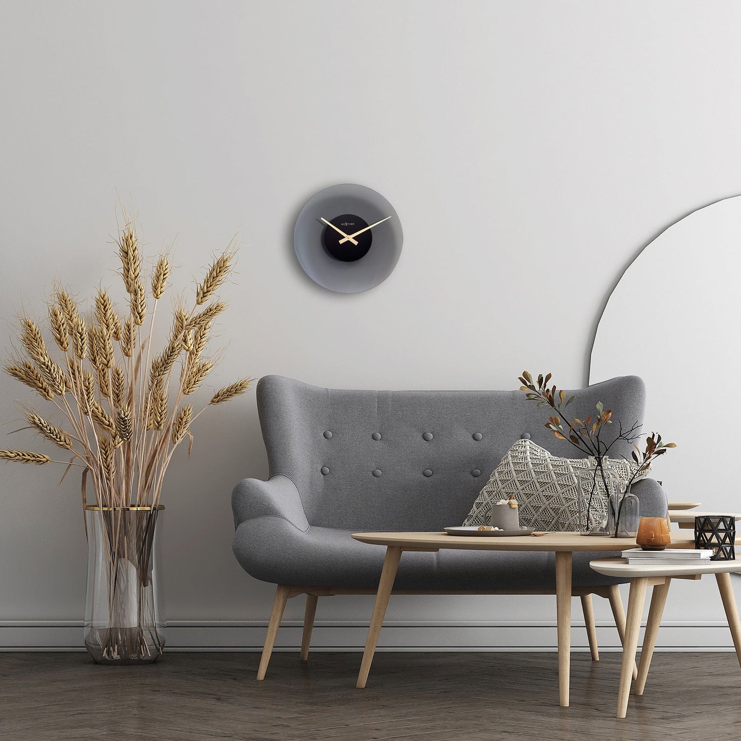 NeXtime Clocks 40cm silent glass wall clock with a modern "Float" design, suitable for contemporary interior decor.