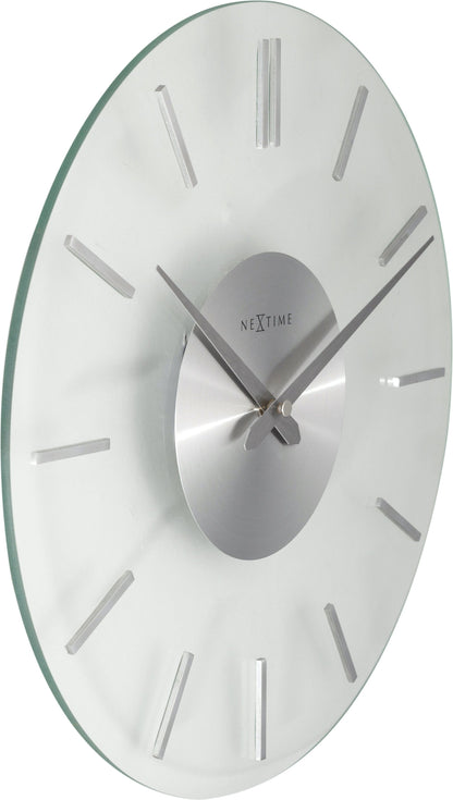 NeXtime Clocks wall clock with a 26 cm aluminum and glass design featuring a modern stripe pattern.