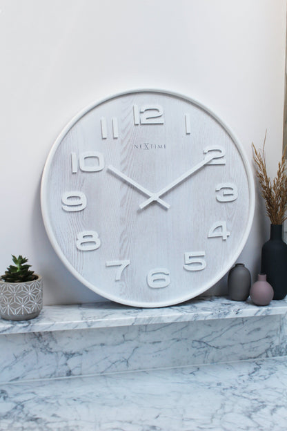 Wood Wood Medium wall clock by NeXtime Clocks, 35 cm diameter, featuring a natural wood finish and modern design.