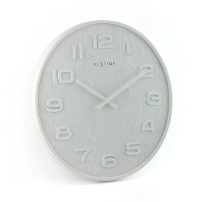 NeXtime Wood Wood Medium wall clock, 35 cm diameter, wooden finish with black hour and minute hands, left side view.