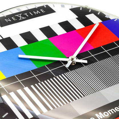 NeXtime Clocks 35 cm dome glass wall clock with modern design and clear dial, perfect for contemporary home decor.