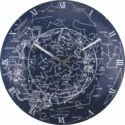 NeXtime wandklok van 35 cm met glazen koepel en glow-in-the-dark ontwerp met Melkweg-thema, geschikt voor muurdecoratie.