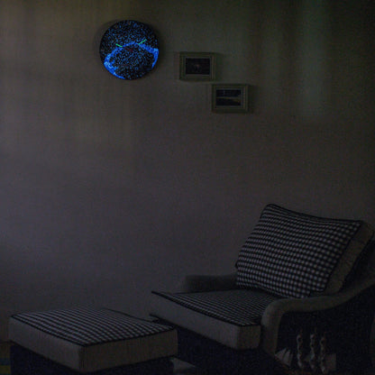 NeXtime wandklok van 35 cm met melkglazen bol en glow-in-the-dark sterren en Melkweg design.