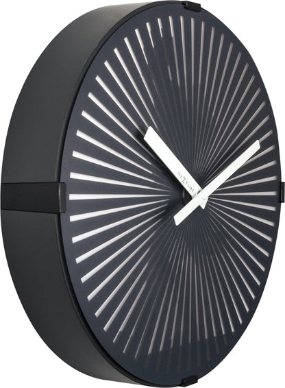 NeXtime Clocks wall clock featuring a 30cm plastic design with a running man motion graphic on the left side.