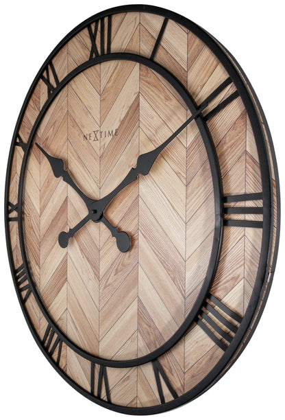 NeXtime Roman Vintage wall clock, 58cm with wooden and metal design, showcasing classic Roman numerals on a vintage-style clock face.