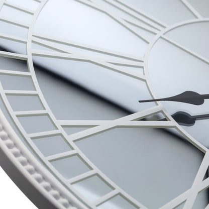 Large 56cm NeXtime Clocks wall clock with mirror finish, silent mechanism, glass face, featuring Cleopatra's Mirror design.