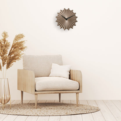 NeXtime Clocks 40cm silent metal wall clock with a sunny design, ideal for modern interior decor.
