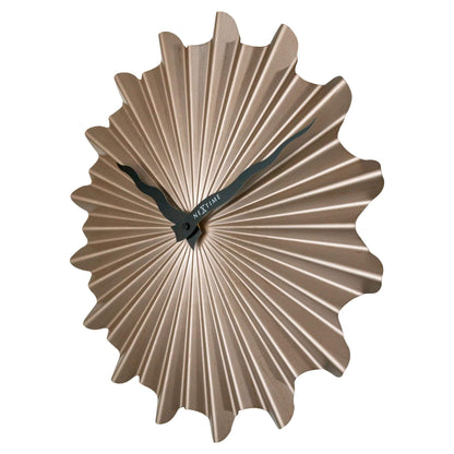 NeXtime Clocks 40cm silent metal wall clock with a sunny design, showcasing a modern style and clean white face with black hands.