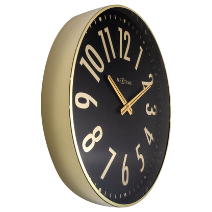 NeXtime Clocks Alchemy wall clock, 40cm metal design, silent movement, displayed from the left side view.