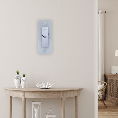 NeXtime wandklok 20x50cm met glazen frosted en spiegelafwerking, stil en modern ontwerp geïnspireerd door Dali.