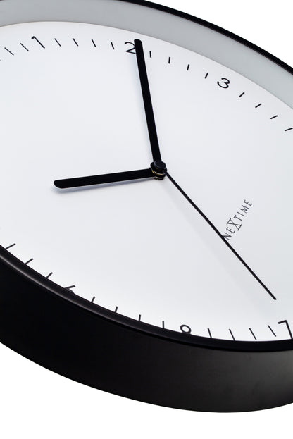 NeXtime Berlin wall clock, 30cm aluminium silent clock with black hour and minute hands, modern design, detailed close-up.