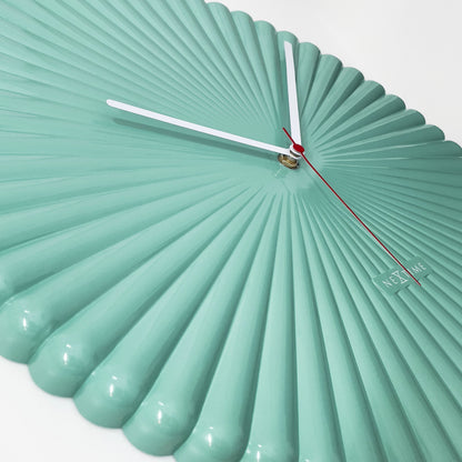 White and green NeXtime Mousse wall clock, 40cm, silent quartz movement, made of polyresin with a modern design.