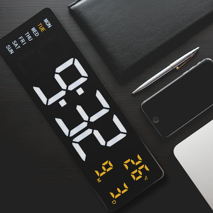NeXtime Super Digi digital wall clock in black with large LED display, measuring 38.8x12.9x3.2cm, made of ABS plastic.