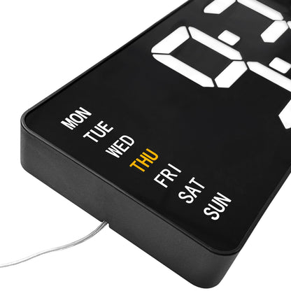 Black NeXtime Super Digi digital wall clock with large LED display and sleek design, measuring 38.8x12.9x3.2cm.