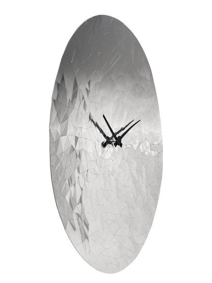 NeXtime stainless steel wall clock with chrome finish, 80cm diameter, featuring a modern fragment design and silent movement.
