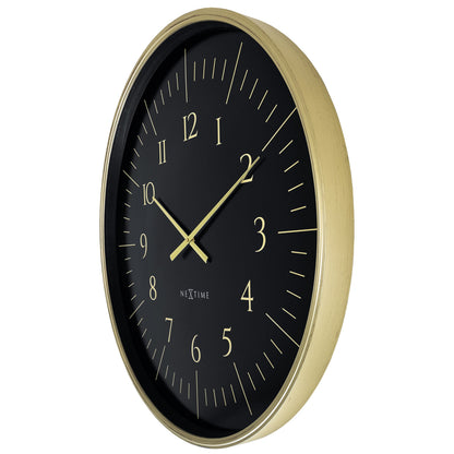 Black and white large NeXtime Galaxy wall clock, 77cm plastic design, showing the clock face from the right side.