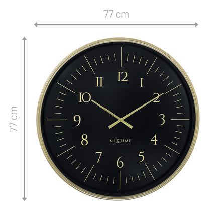 Large black and white NeXtime Galaxy wall clock, 77cm plastic design with a modern galaxy-inspired face.