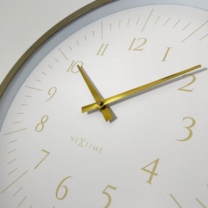 Close-up of NeXtime Galaxy wall clock, 40cm black and white plastic design with sleek, modern appearance.