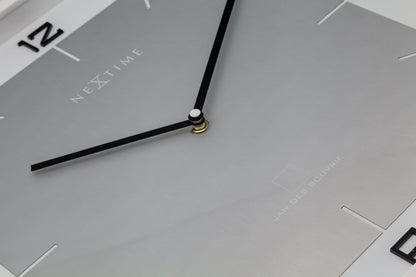 Square wooden wall clock by NeXtime Clocks, 40x40 cm, with minimalist design and black hour and minute hands.