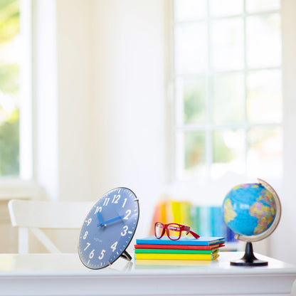 NeXtime Duomo Mini wall or table clock with 20cm diameter, domed glass lens, silent movement, and sleek glass design.