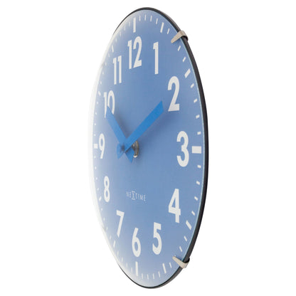 NeXtime Duomo Mini wall or table clock with 20cm diameter, glass domed lens, silent movement, blue face, and minimalist design.