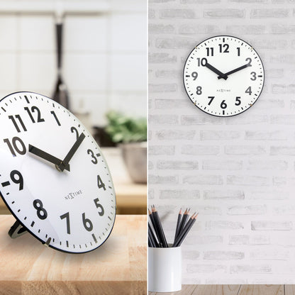 NeXtime Duomo Mini wall or table clock with 20cm diameter, glass domed lens, silent movement, and minimalist design.
