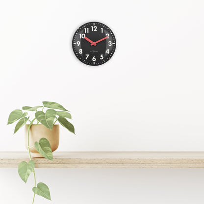 NeXtime Duomo Mini wall or table clock with 20cm diameter, glass dome lens, silent operation, and modern design.