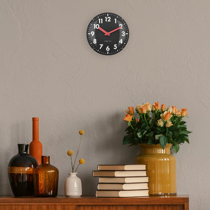 NeXtime Duomo Mini wall or table clock with 20cm diameter glass dome lens, silent movement, and modern design.