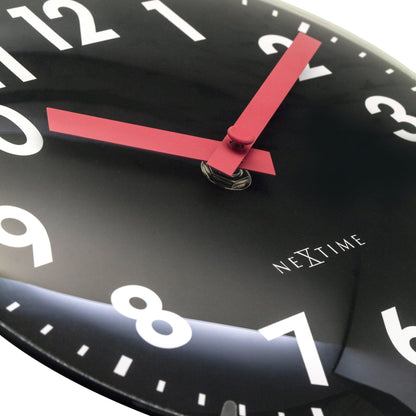 NeXtime Duomo Mini wall or table clock with 20cm diameter, domed glass lens, silent movement, and modern glass design.