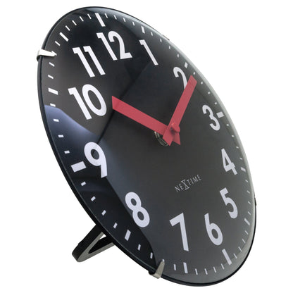 NeXtime Duomo Mini wall or table clock with 20cm diameter, glass dome lens, silent movement, and minimalist design.