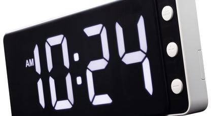 NeXtime digital wall or table clock with white LED display, measuring 27.2x10.8x3cm, made of ABS material.