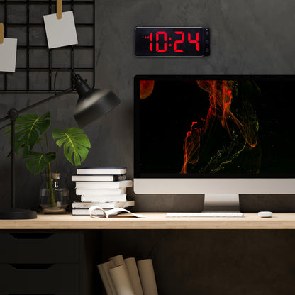 NeXtime digital table or wall clock in red LED display, measuring 27.2x10.8x3cm, made of ABS plastic.