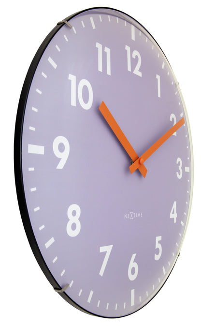NeXtime Duomo wall clock with 35cm domed glass lens, silent mechanism, black hands, and minimalist design on a white face.