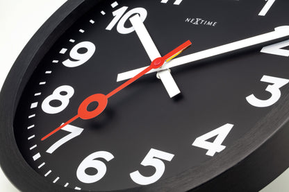 NeXtime Station All Black wall clock, 35cm diameter, silent movement, black anodized aluminum finish, modern design.