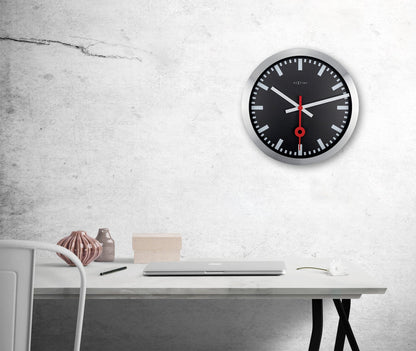 Black aluminum NeXtime Station Stripe wall or table clock with minimalist design and modern style.