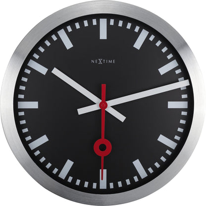 Black aluminum NeXtime Station Stripe wall or table clock with a modern design and sleek finish.