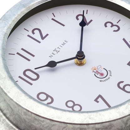 Weatherproof outdoor garden wall clock by NeXtime Clocks, 22cm metal galvanized Poppy design with black numerals.