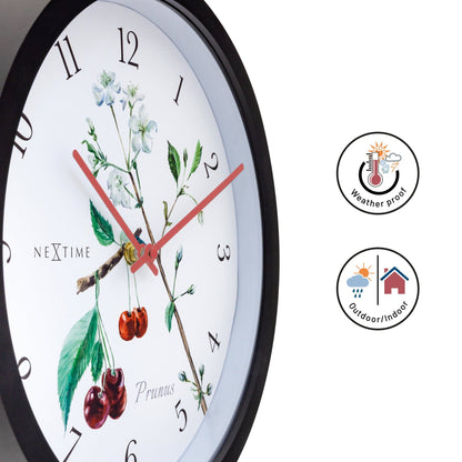 Weatherproof outdoor garden clock by NeXtime Clocks, 30.5 cm diameter with Prunus design, suitable for outdoor use.