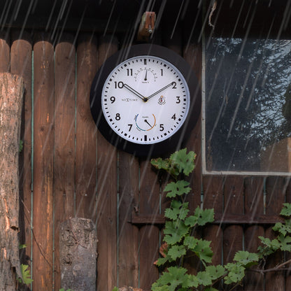 NeXtime Clocks garden weatherproof wall clock with 25.5 cm diameter featuring a Daisy design, suitable for outdoor use.
