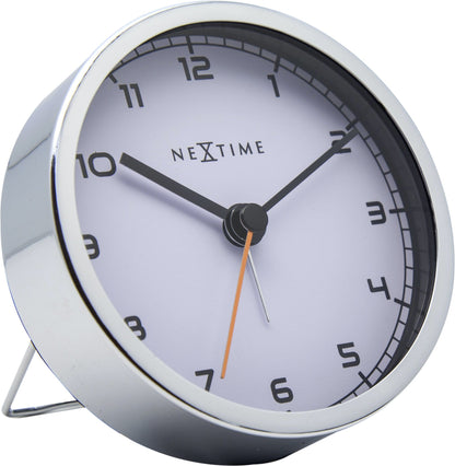 NeXtime Clocks metal alarm clock measuring 9x9x7.5 cm, with a sleek design and the 'Company Alarm' label, viewed from the left side.