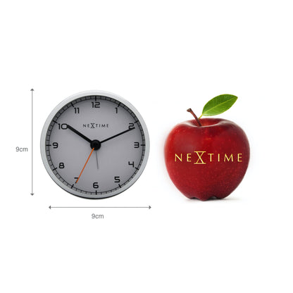 NeXtime Clocks metal alarm clock, 9x9x7.5 cm, black with white clock face and alarm setting dial.