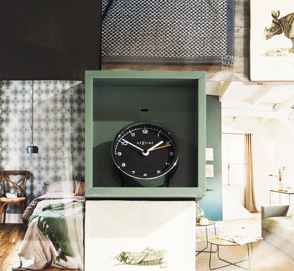 NeXtime Clocks metal alarm clock, 9 x 9 x 7.5 cm, with classic design and clear clock face showing time.