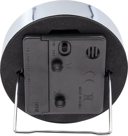 NeXtime Clocks metal alarm clock, 9x9x7.5cm, with digital display and 'Company Alarm' branding, viewed from the back.