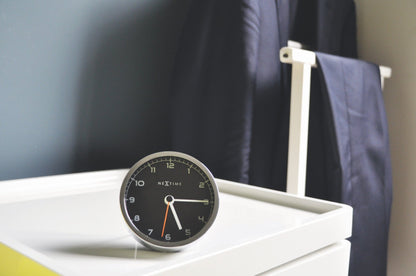 NeXtime Clocks metal alarm clock, 9x9x7.5 cm, with classic face and twin bells, labeled 'Company Alarm' on the dial.