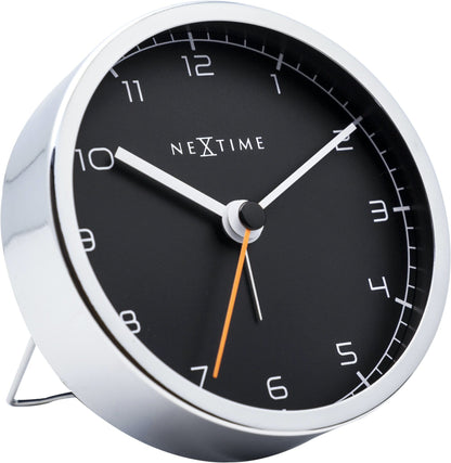 NeXtime Clocks metal alarm clock with 9x9x7.5 cm size, showing the left side view with a classic design.